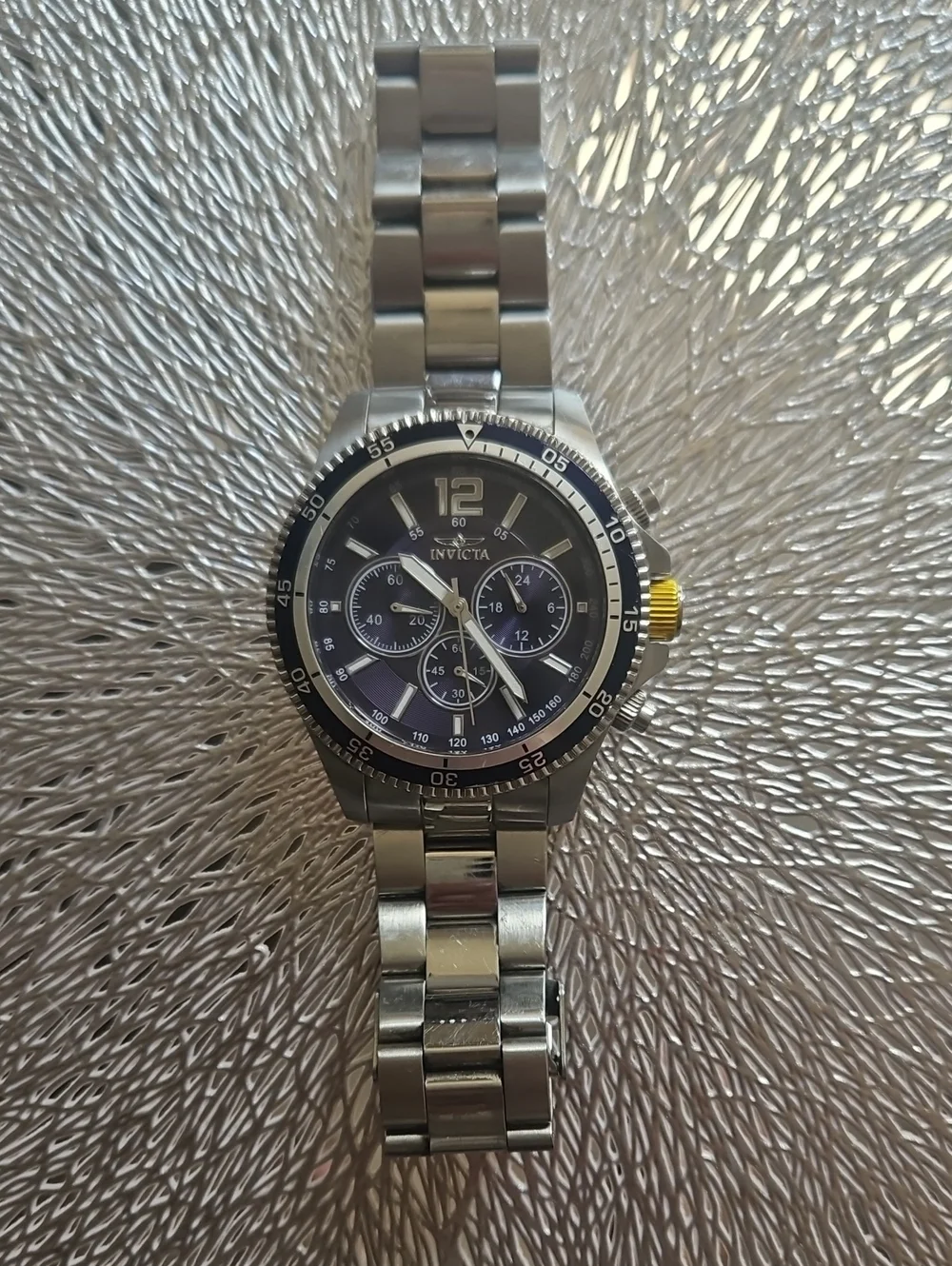 Invicta Silver Stainless Steel Watch with Black Dial and Yellow Crown